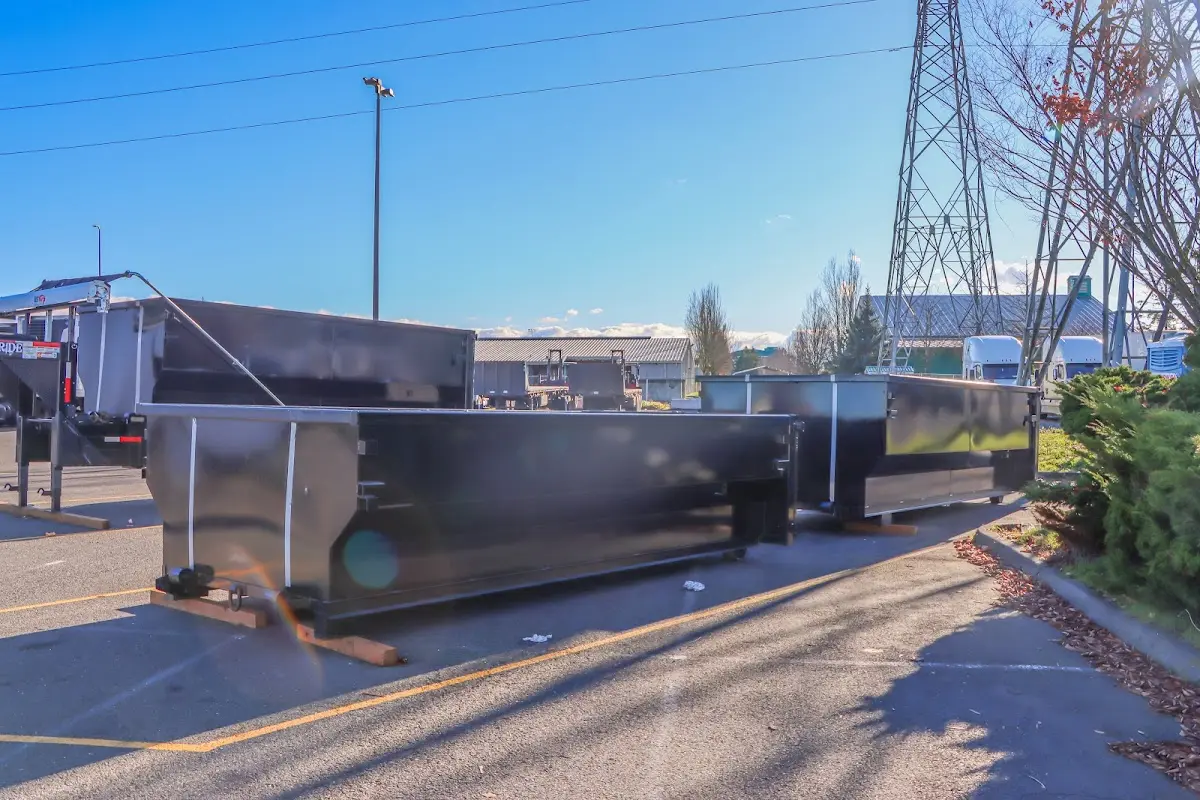 Roll-off dumpster ready for waste disposal at job site for Commercial Dumpster Rental in Monona
